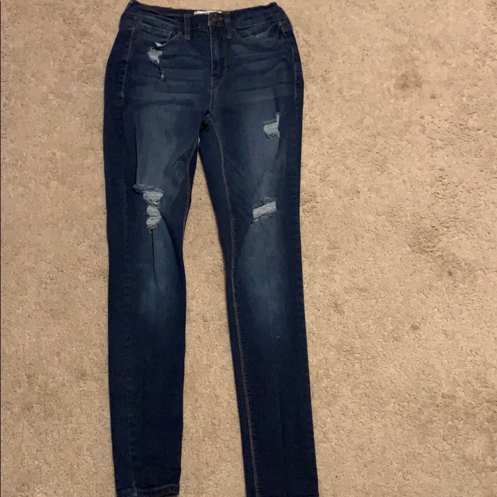 high waisted ripped blue jeans
